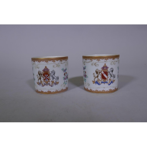 7 - A pair of Chinese export armorial tea cups and saucers, late C18th/early C19th, saucer 5