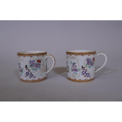 7 - A pair of Chinese export armorial tea cups and saucers, late C18th/early C19th, saucer 5