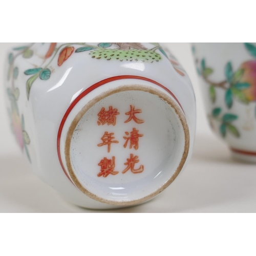 18 - A pair of famille vert enamelled porcelain tea bowls with peach tree decoration, Chinese Guangxu 6 c... 