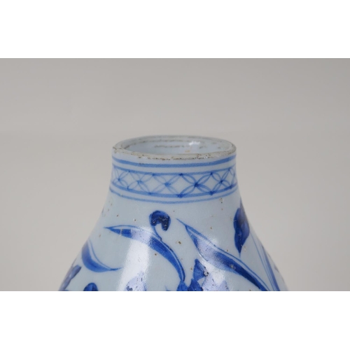 23 - A Chinese Ming style blue and white porcelain double gourd vase, with waterfowl and lotus flower dec... 