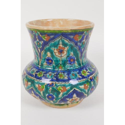 27 - A Jerusalem earthenware vase of squat form painted with fruit and flowers, 6