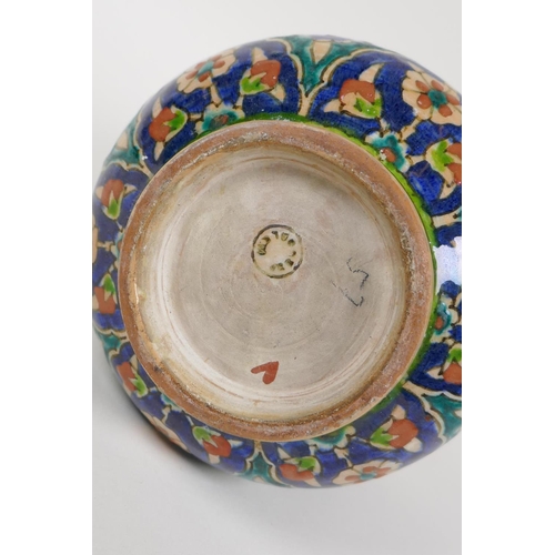 27 - A Jerusalem earthenware vase of squat form painted with fruit and flowers, 6