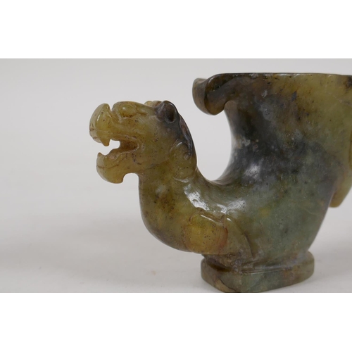 32 - A Chinese mottled green jade rhyton with carved mask and kylin decoration, 4