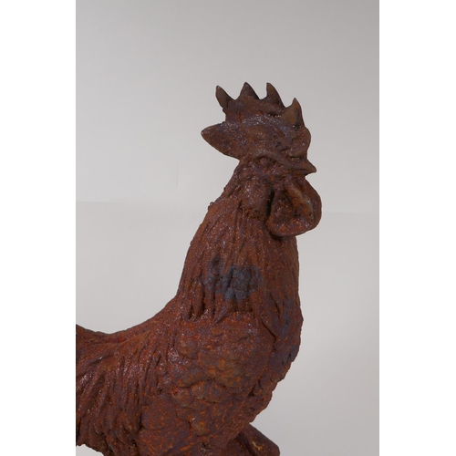 34 - A cast iron garden figure of a cockerel, 16