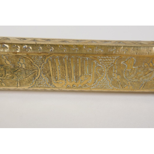 35 - A Persian engraved brass scribes box, 9½