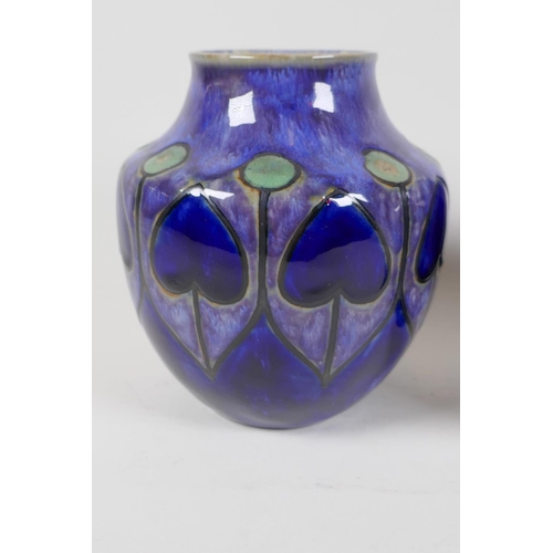 39 - A pair of Royal Doulton Art Nouveau pattern stoneware vases, marked for Ethel Beard, 6½