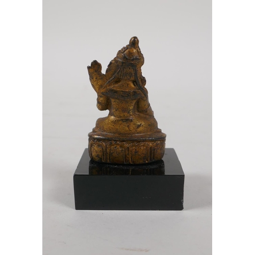 42 - A Sino Tibetan gilt bronze figure of Buddha, on a display stand, 3