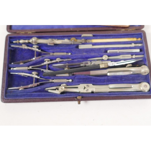 47 - A cased technical drawing set and a silver plated cigarette box