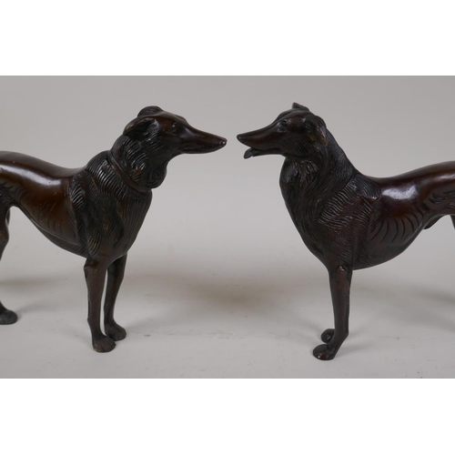 49 - A pair of bronze figures of hounds, 6½