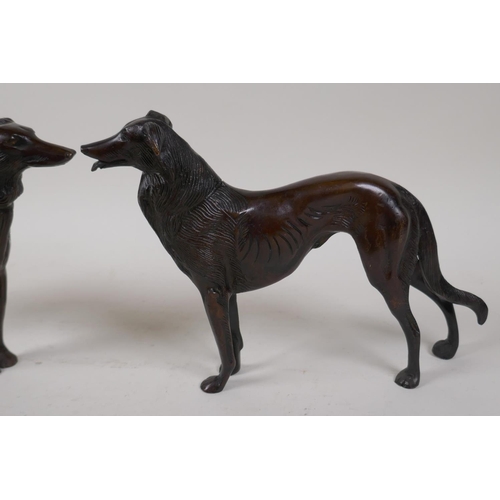 49 - A pair of bronze figures of hounds, 6½