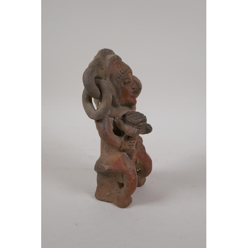 56 - A pre-Columbian painted terracotta figure, 7