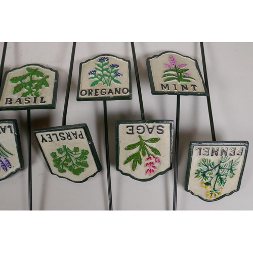 59 - A set of twelve painted cast iron herb markers, 3