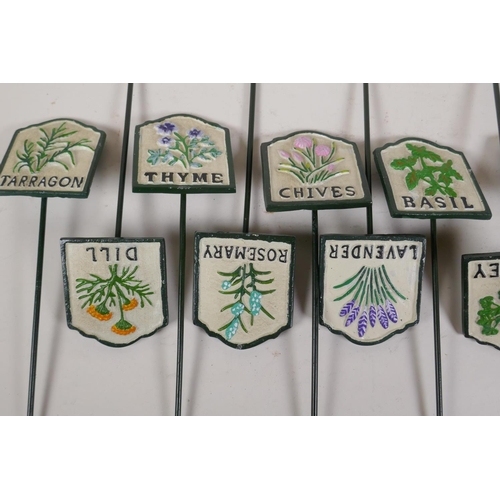 59 - A set of twelve painted cast iron herb markers, 3