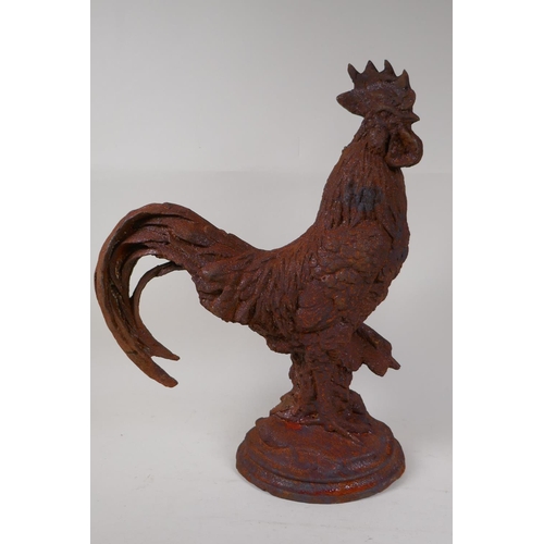 84 - A cast iron garden figure of a cockerel, 16