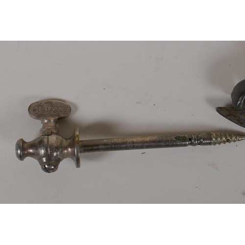 11 - Two antique cork screws, a 'Bully Beef' tin opener and a Champagne tap