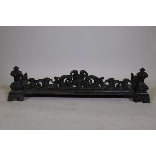 1205 - A Victorian cast iron fire surround with Rococo style decoration, 41