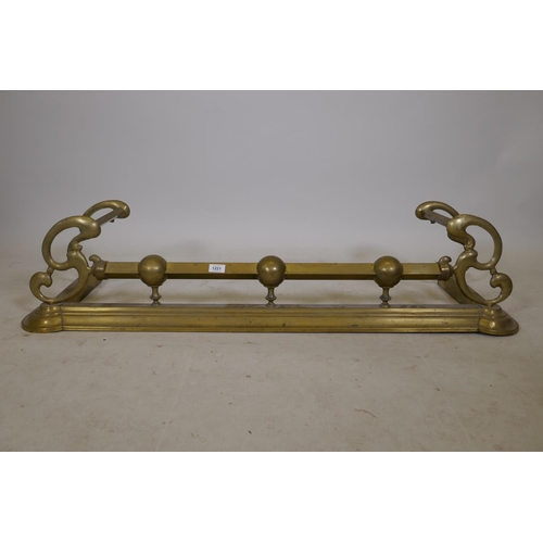 1221 - A Victorian brass fire fender, 49