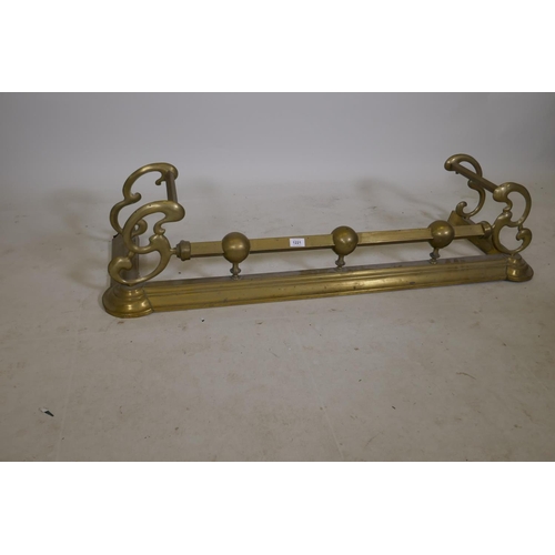 1221 - A Victorian brass fire fender, 49