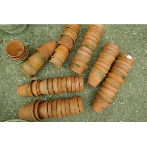 1223 - A large collection of terracotta plant pots, approx 70, 6