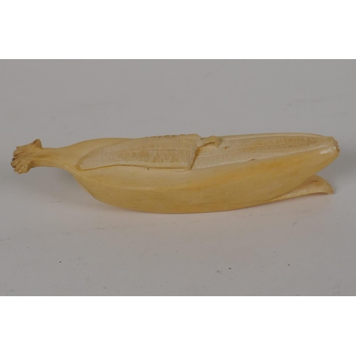 15 - A Japanese Meiji period okimono carved as a banana, 5½