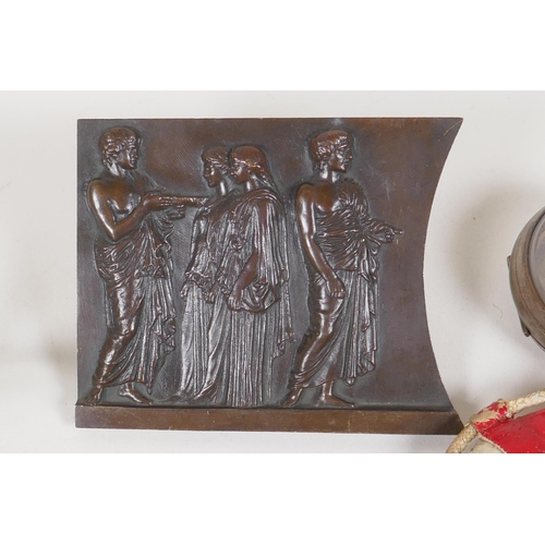 19 - A bronze plaque embossed with classical figures, horn cane handle etc