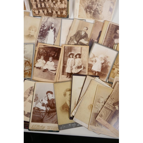 32 - A quantity of Victorian portrait photographs and cartes de visites, 4