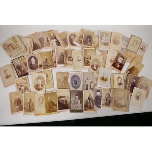 35 - A quantity of Victorian portrait photographs and cartes des visites, approximately 90, 4