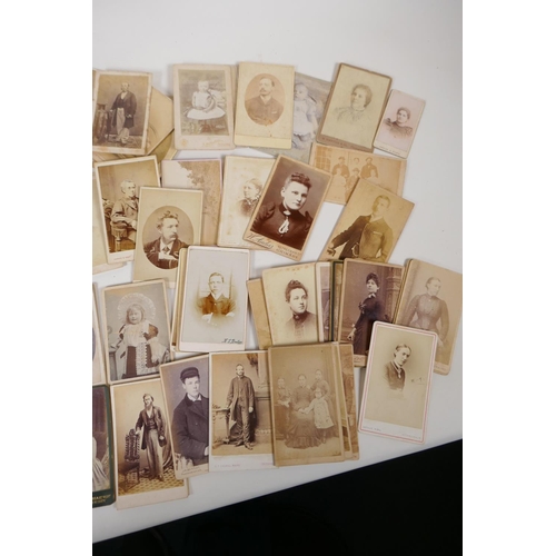 35 - A quantity of Victorian portrait photographs and cartes des visites, approximately 90, 4