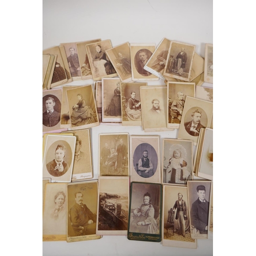 35 - A quantity of Victorian portrait photographs and cartes des visites, approximately 90, 4