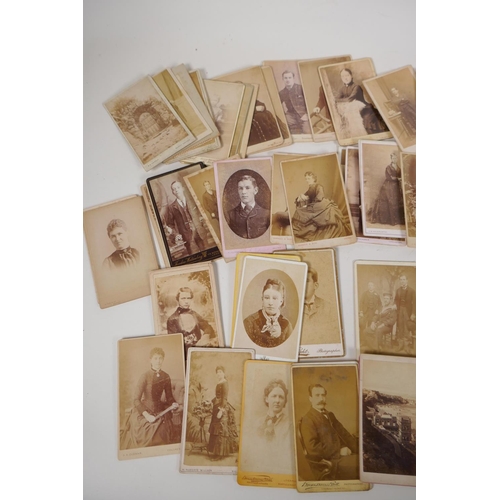 35 - A quantity of Victorian portrait photographs and cartes des visites, approximately 90, 4