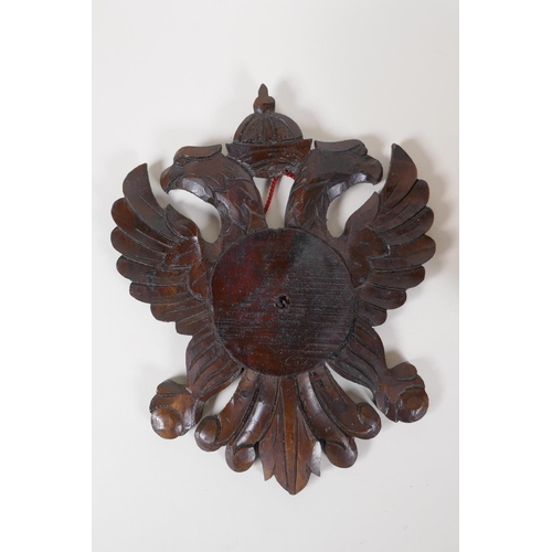 36 - A Continental carved wood double headed eagle mount and a turned specimen wood ball, mount 10