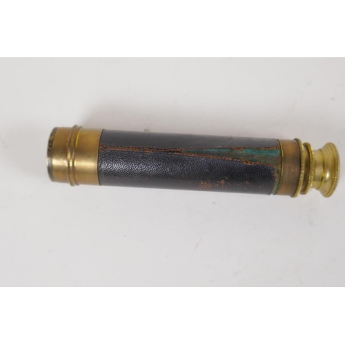 4 - A small antique brass three draw telescope, 14