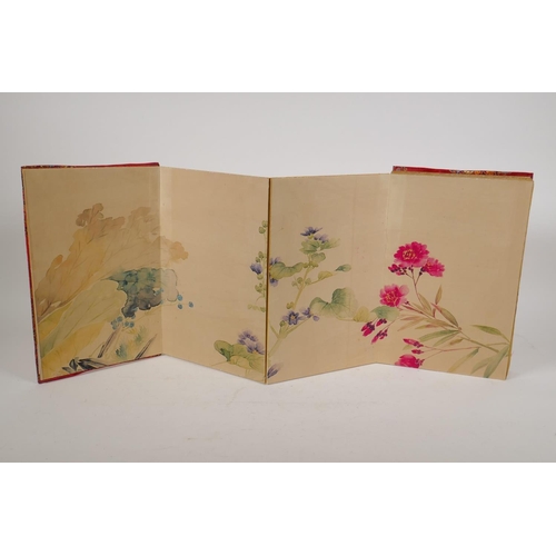 41 - A Chinese printed watercolour concertina book unfolding to make a single image of flowers, 7