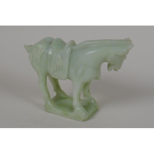 42 - A Chinese green hardstone Tang style model of a horse, 4