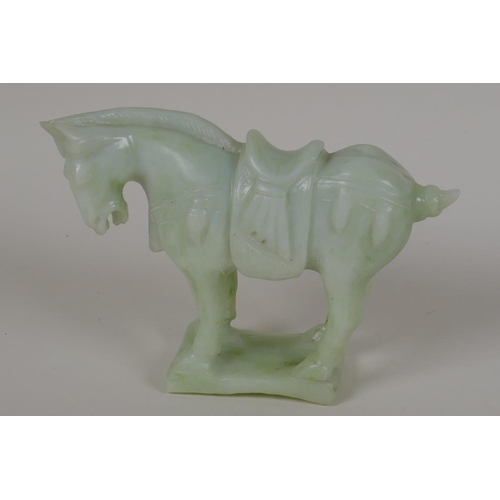 42 - A Chinese green hardstone Tang style model of a horse, 4