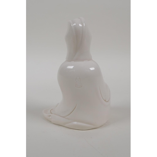 18 - A Chinese blanc de chine porcelain Quan Yin, impressed mark to the reverse, 5