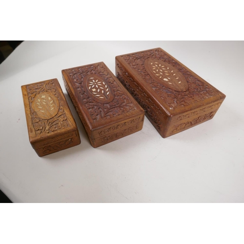 19 - A set of three Anglo Indian hardwood nesting boxes with carved and bone inlaid decoration, largest 1... 