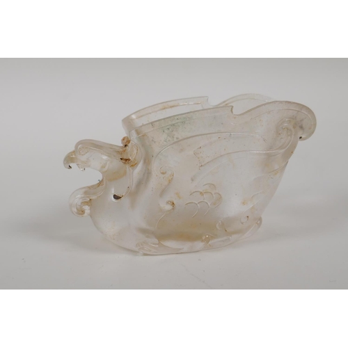 25 - A Chinese moulded glass libation cup in the form of a phoenix, 4½