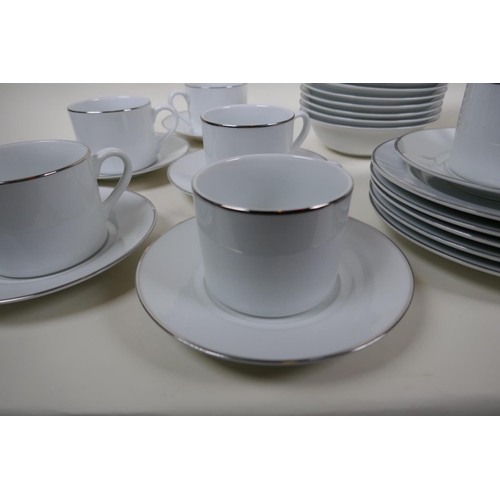 29 - A Royal Worcester 'Classic Platinum' dinner and tea service, eight 10½