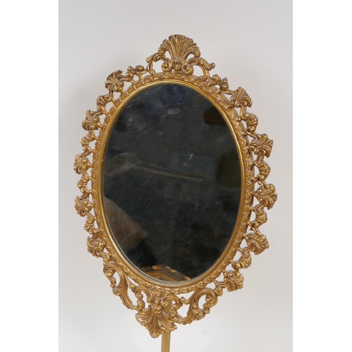 42 - A cast brass framed dressing table mirror on pedestal stand, 17½