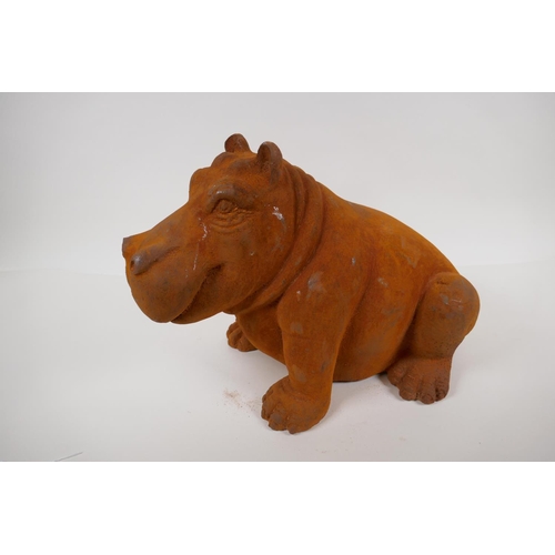 44 - A cast iron garden figure of a hippopotamus, 11