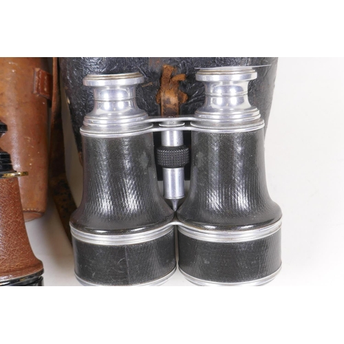 5 - Three pairs of vintage binoculars in leather cases