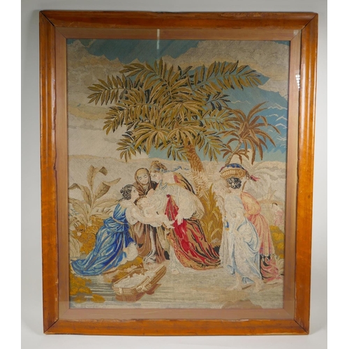 51 - A C19th needlework tapestry panel depicting Moses and the Pharoah's daughter at the river's edge, in... 