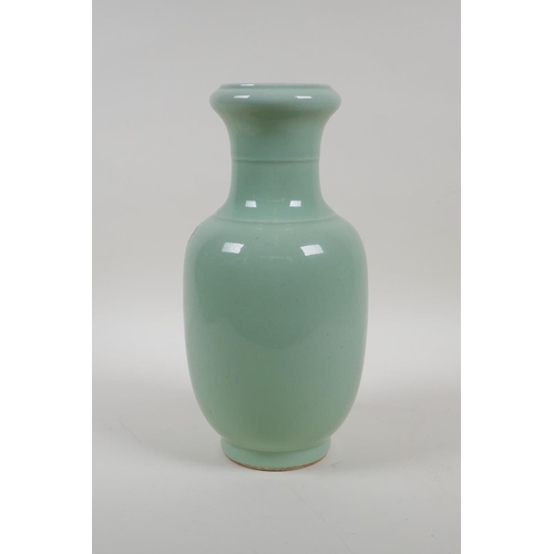 55 - A celadon glazed porcelain vase with raised peach and bat decoration, Chinese Qianlong seal mark to ... 