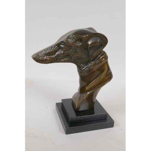 7 - A bronze bust head of a greyhound on a stepped marble base, 9