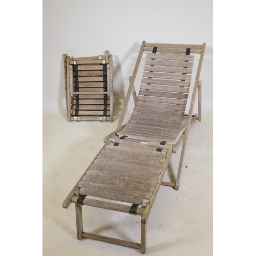 1187 - A slat back teak deck chair, and two stools