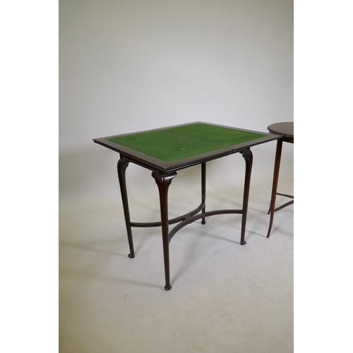 1184 - A Victorian mahogany fold over card table on cabriole legs with shaped stretcher, 28