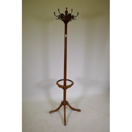 1197 - A Victorian walnut hat stand with fluted details and four splayed supports, AF, 76