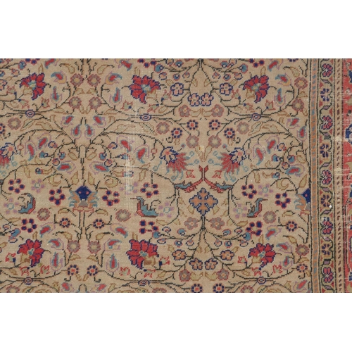 1174 - An antique Anatolian Kayseri cream ground wool rug with multi-colour all over floral design, AF wear... 