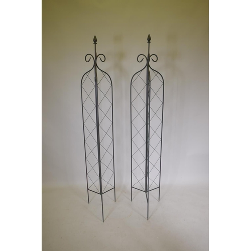 1176 - A pair of trefoil folding metal plant towers with lattice design, 180cm high